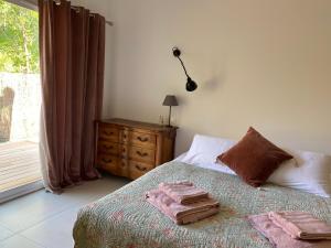 Postel nebo postele na pokoji v ubytování La Petite Caserne - Gite 4 étoiles -