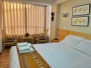 Postel nebo postele na pokoji v ubytování Hostal Casona Arrambide