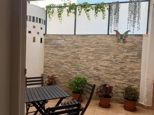 Patio nebo venkovní prostory v ubytování Patio Port Serrallo