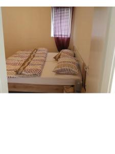 Кровать или кровати в номере Apartment Petrus