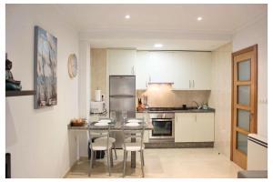 Kuchyň nebo kuchyňský kout v ubytování Apartamento TIERRA + 18 fotografií