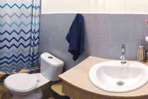 Ванная комната в Departamento cómodo vacacional