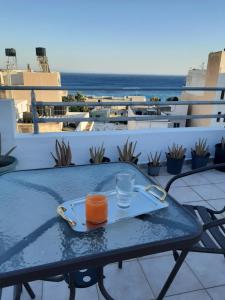A balcony or terrace at Comfy Apartment near the Sea