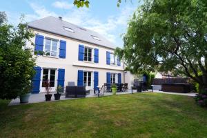 Aed väljaspool majutusasutust Villa du Littoral