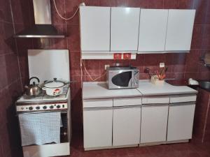 Η κουζίνα ή μικρή κουζίνα στο Merabi and Neli Guest House +50 φωτογραφίες