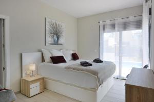 Posteľ alebo postele v izbe v ubytovaní Hillside Luxury Villas by NRAS
