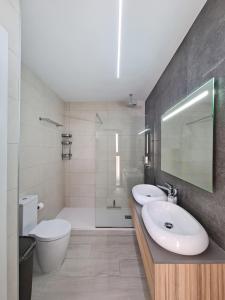 Kúpeľňa v ubytovaní Hillside Luxury Villas by NRAS