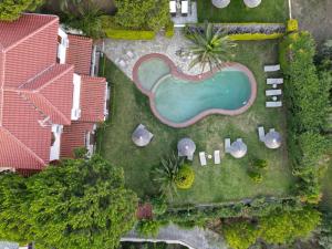 an overhead view of a swimming pool in a yard at Villa Xanthippi in Agia Paraskevi