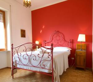 Säng eller sängar i ett rum på Villa degli Ulivi