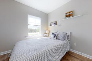 Postel nebo postele na pokoji v ubytování Coastal Corner - 17703 Wilkens Way