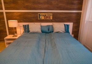 Posteľ alebo postele v izbe v ubytovaní Liszt Studio Holiday Home