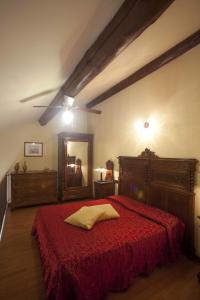 Letto o letti in una camera di Agriturismo Il Bove