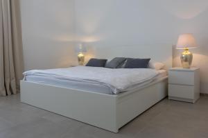 Letto o letti in una camera di The View Split. Highlight with Roof-Top-Terrace and Pool