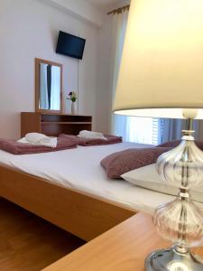 Posteľ alebo postele v izbe v ubytovaní Hotel B&B CHAMBERLAIN
