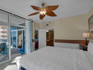 a bedroom with a bed and a ceiling fan at Jade East Towers 0640 by Newman-Dailey in Destin