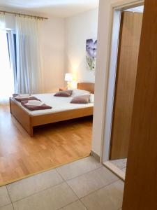 Posteľ alebo postele v izbe v ubytovaní Hotel B&B CHAMBERLAIN