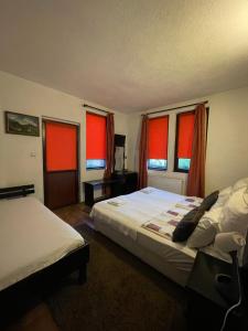 Postel nebo postele na pokoji v ubytování Guest house Elit