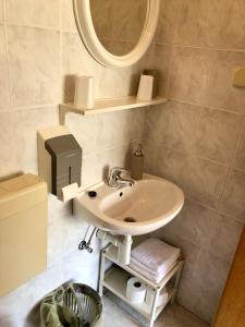 Kúpeľňa v ubytovaní Hotel B&B CHAMBERLAIN