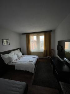 Postel nebo postele na pokoji v ubytování Guest house Elit