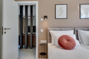 Ένα ή περισσότερα κρεβάτια σε δωμάτιο στο Villa Atrio