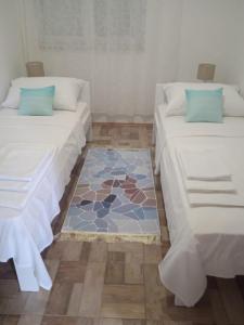 Postel nebo postele na pokoji v ubytování Apartments Jela