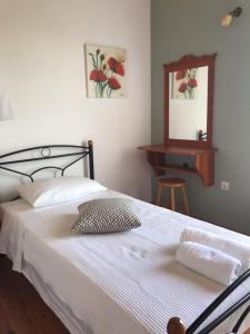 A bed or beds in a room at Regina Villa