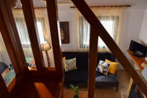 TV a/nebo společenská místnost v ubytování Blu Casa Del Mare