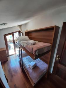 a bedroom with a bunk bed in a room at La casa di Walter e Rosa in Castel di Sangro