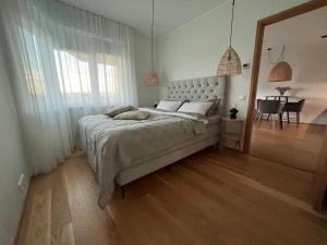 Postel nebo postele na pokoji v ubytování Seaside apartment