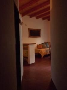 A bed or beds in a room at Cabañas La Morera