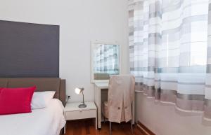 Posteľ alebo postele v izbe v ubytovaní Apartman Pegla
