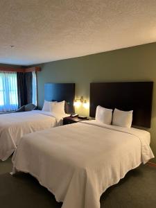 Voodi või voodid majutusasutuse The Grand Hotel Nanaimo toas