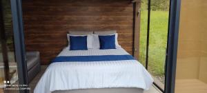 Voodi või voodid majutusasutuse Glamping Mirador del Guavio toas +18 fotot