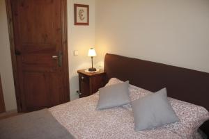 Posteľ alebo postele v izbe v ubytovaní Apartamentos Valle de Aran