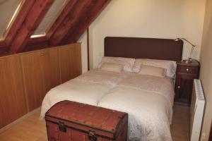 Posteľ alebo postele v izbe v ubytovaní Apartamentos Valle de Aran