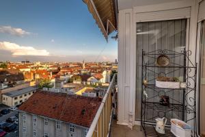 a balcony with a view of a city at Art Deco Zagreb centre view in Zagreb