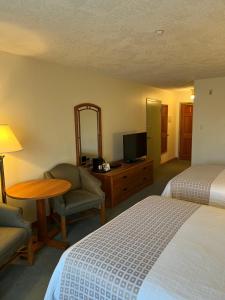 Voodi või voodid majutusasutuse The Grand Hotel Nanaimo toas
