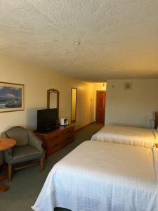 Voodi või voodid majutusasutuse The Grand Hotel Nanaimo toas