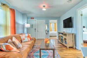 a living room with a couch and a table at Downtown Brockton Apt Less Than 1 Mi to Local Dining in Brockton