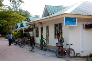 a group of bikes parked outside of a store at Chez Marston in La Digue