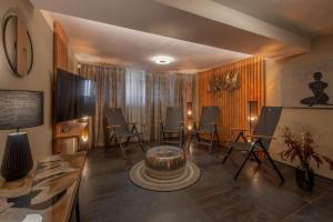 TV a/nebo společenská místnost v ubytování Redfoxapartment Central