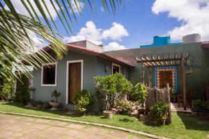 Foto da galeria de SURF HOUSE MORRO DO CHAPÉU "Pé na areia" em Taíba