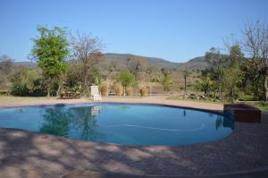 The swimming pool at or close to Copacopa Lodge and Conference Centre