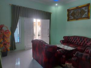 Posezení v ubytování Shaima Homestay Syari'ah