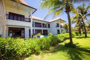 Photo de la galerie de l'établissement Outstanding Villa In Beach Resort, à Đà Nẵng