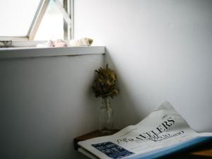 Postel nebo postele na pokoji v ubytování WhyKumano