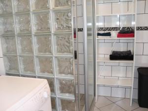 a shower with glass doors in a bathroom at 4 person holiday home in MUNKA-LJUNGBY-By Traum in Munka-Ljungby