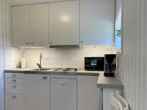 Kuchyň nebo kuchyňský kout v ubytování Holiday home Skärhamn VII