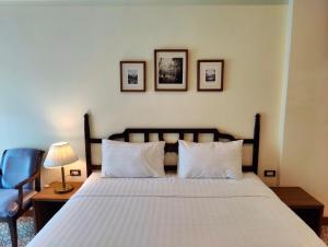 Baan Chao Khun Hotel客房内的一张或多张床位