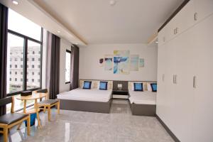 Postel nebo postele na pokoji v ubytování King House Hotel + 11 fotografií